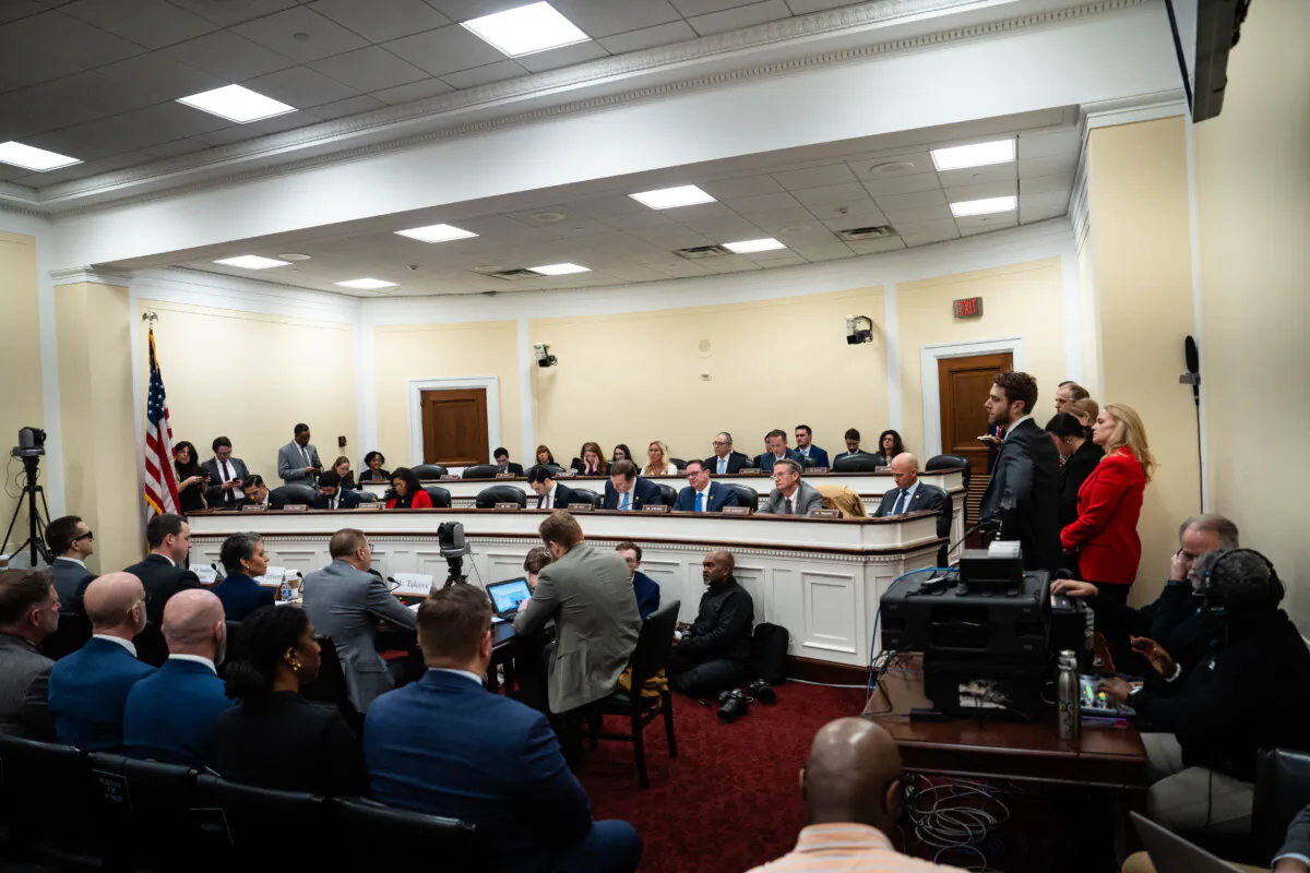 The House Oversight Delivering on Government Efficiency Subcommittee Chair Rep. Marjorie Taylor Greene (R-Ga.) and other lawmakers meet at a hearing on Capitol Hill in Washington on Feb. 12, 2025. (Madalina Vasiliu/The Epoch Times)