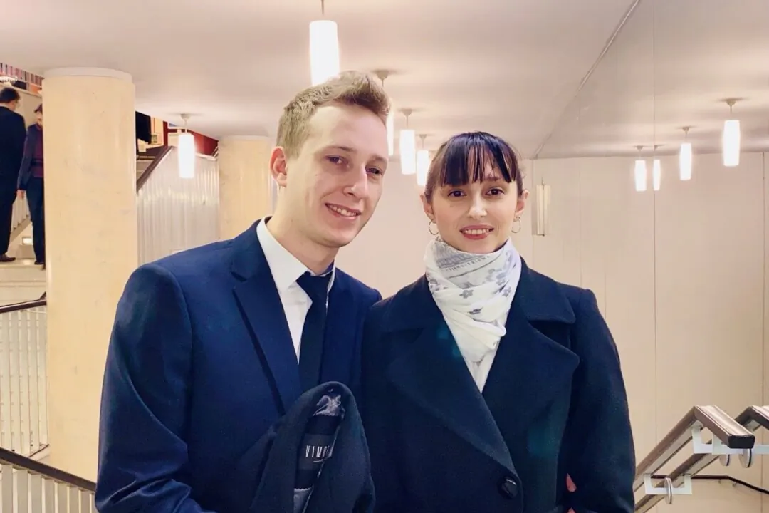 Saranie Godajew and her boyfriend, Kamil Rutkowski, at the Shen Yun Performing Arts performance at the Grand Theater in LODZ, on Jan. 17, 2025. (Hai Ying/The Epoch Times)