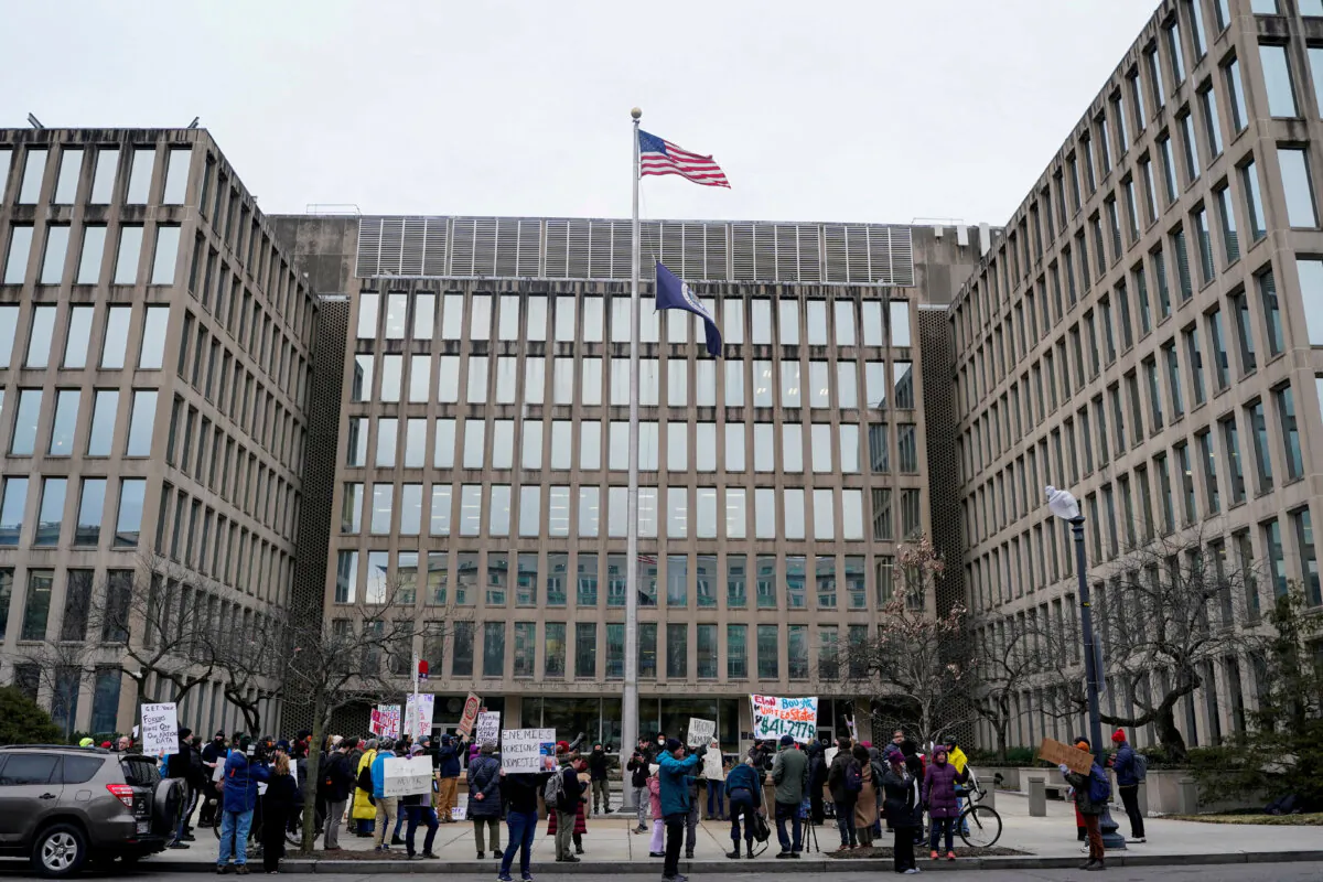 Demonstrators rally outside the U.S. Office of Personnel Management in Washington on Feb. 5, 2025. (Nathan Howard/Reuters)