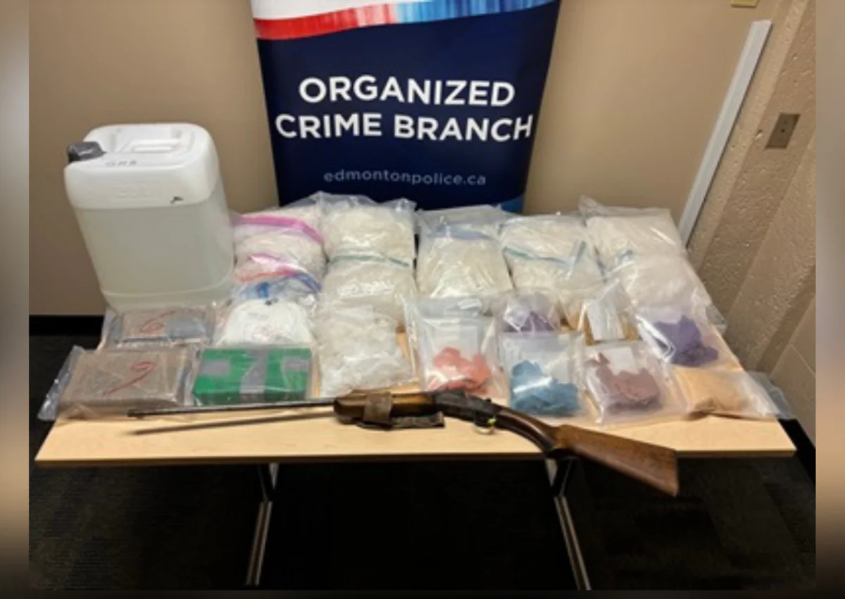 Drugs, drug production materials, and firearm seized by the Edmonton Police Service on Jan. 28, 2025. (Edmonton Police Service/Handout Photo)