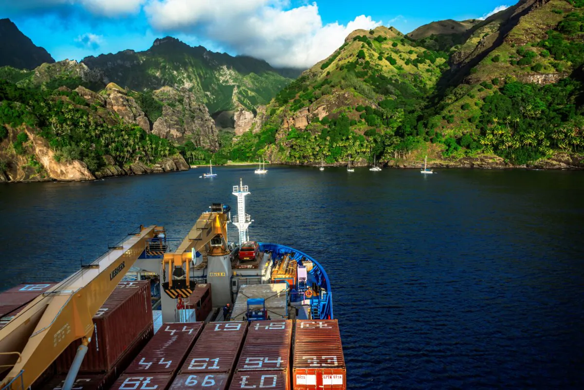 The Aranui 5 anchored near the entrance to the cliff-cloistered Bay of Virgins on Fatu Hiva. (Maria Coulson)