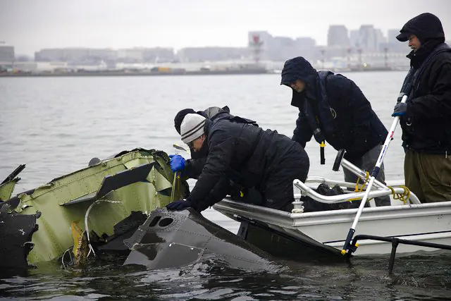 NTSB investigators on scene of the Jan. 29 Bombardier CRJ700 and Sikorsky UH-60 Black Hawk midair collision on the Potomac River near Reagan National Airport, on Feb. 3, 2025. (NTSB)