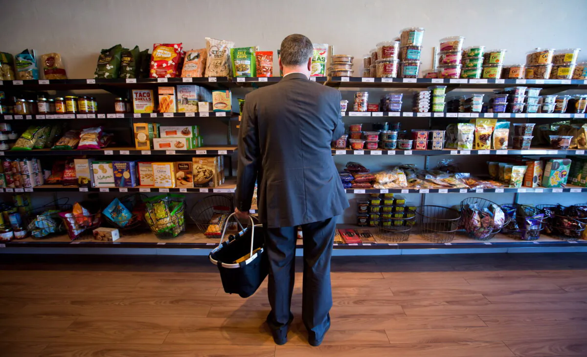 A customer browses the shelves at a grocery store in Vancouver in a file photo. (The Canadian Press/Darryl Dyck)