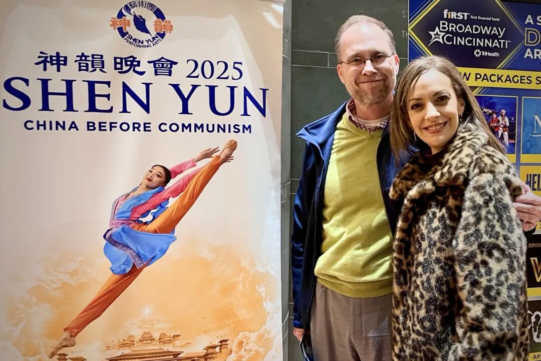 Brian Dowlang (L) enjoyed Shen Yun's evening performance at the Aronoff Center for the Arts on Feb. 15, 2025. (Charlie Lu/The Epoch Times)