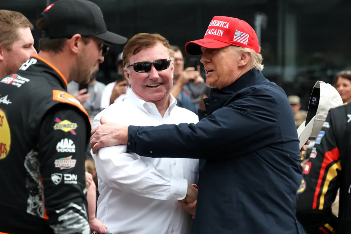 President Donald Trump greets RCR team owner and NASCAR Hall of Famer Richard Childress on the grid prior to the NASCAR Cup Series Daytona 500 at Daytona International Speedway in Daytona Beach, Fla., on Feb. 16, 2025. (Chris Graythen/Getty Images)