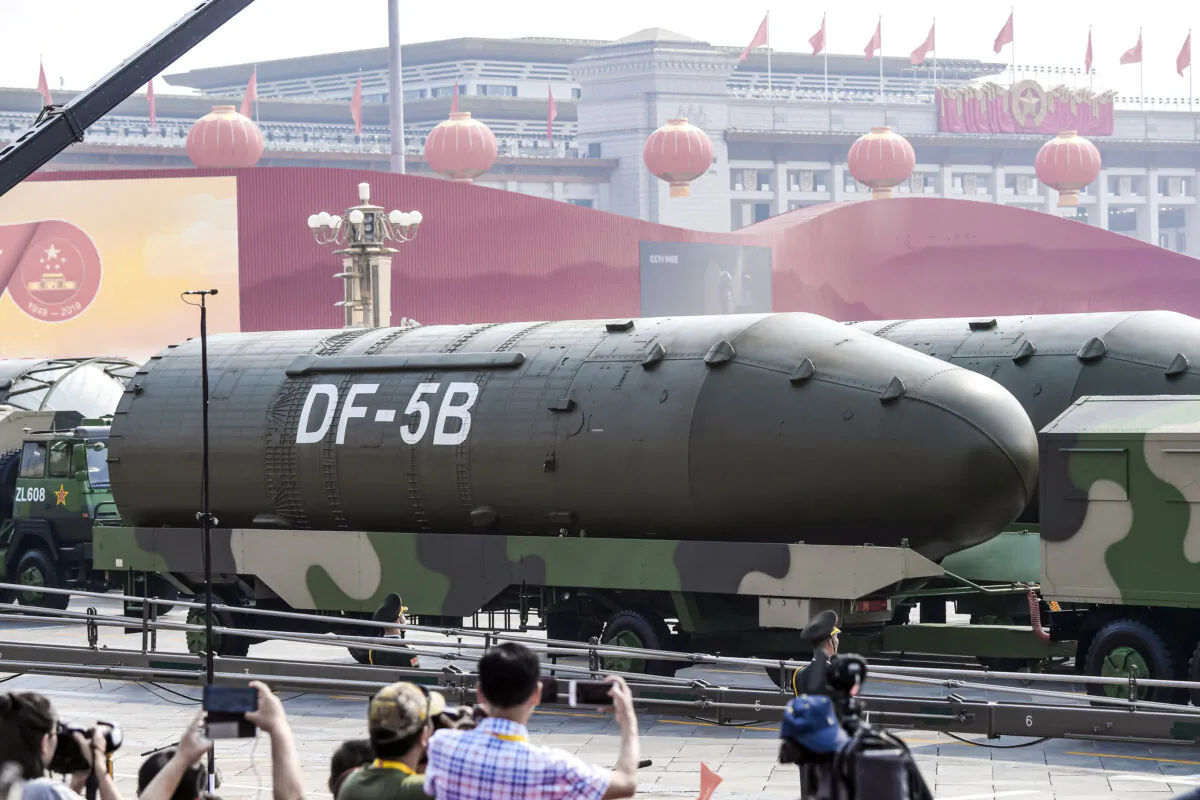 Military vehicles carrying DF-5B intercontinental ballistic missiles participate in a military parade at Tiananmen Square in Beijing on Oct. 1, 2019. (Greg Baker/AFP via Getty Images)