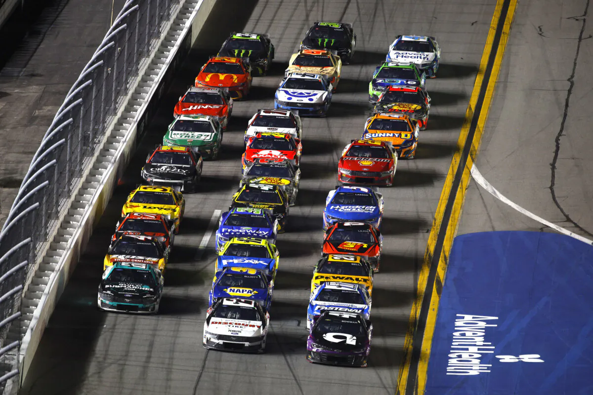 Alex Bowman, driver of the #48 Ally Chevrolet, Austin Cindric, driver of the #2 Discount Tire Ford and Ryan Preece, driver of the #60 BuildSubmarines.com Ford race during the NASCAR Cup Series Daytona 500 at Daytona International Speedway in Daytona Beach, Fla., on Feb. 16, 2025. (Mike Ehrmann/Getty Images)