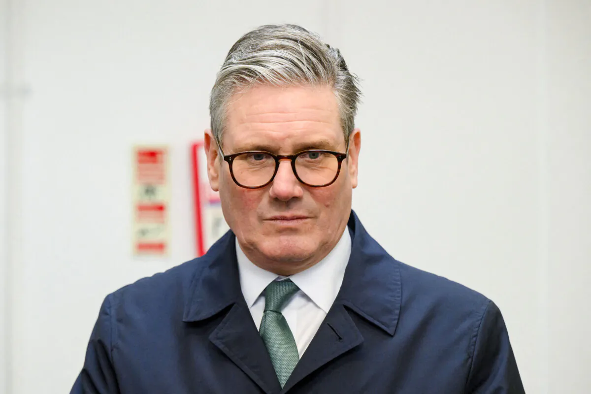 British Prime Minister Keir Starmer visits the community kitchen at the Newquay Orchard in Newquay, England, on Feb. 10, 2025. (Leon Neal/Pool via REUTERS)