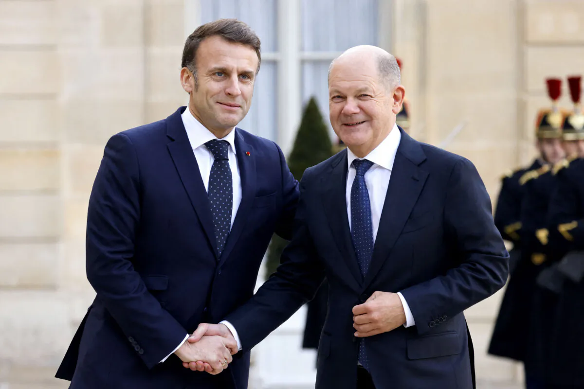 French President Emmanuel Macron welcomes Germany's Chancellor Olaf Scholz before an informal summit of European leaders to discuss the situation in Ukraine and European security at The Elysee Presidential Palace in Paris on Feb. 17, 2025. (Ludovic Marin/AFP via Getty Images)