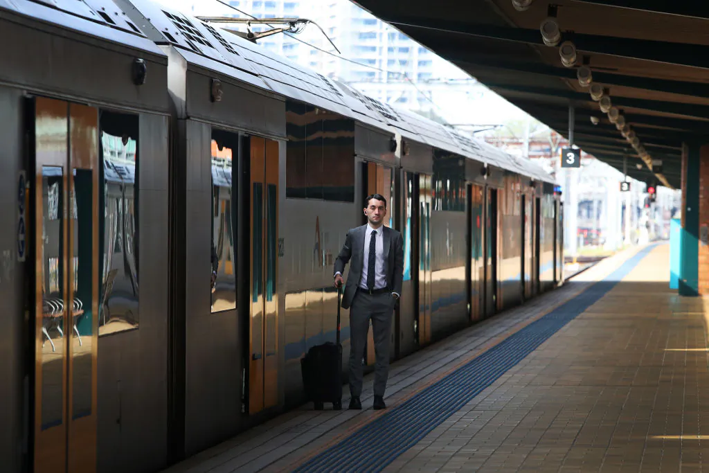 A commuter waits to board a train at Central railway station in Sydney, Australia, on Jan. 15, 2025. (Lisa Maree Williams/Getty Images)