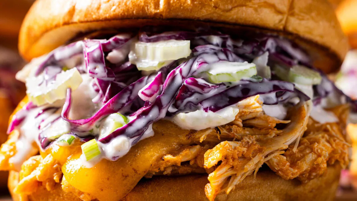 Rotisserie chicken meets its new best friend, Buffalo sauce, in these speedy weeknight sandwiches. (Steve Klise/TCA)