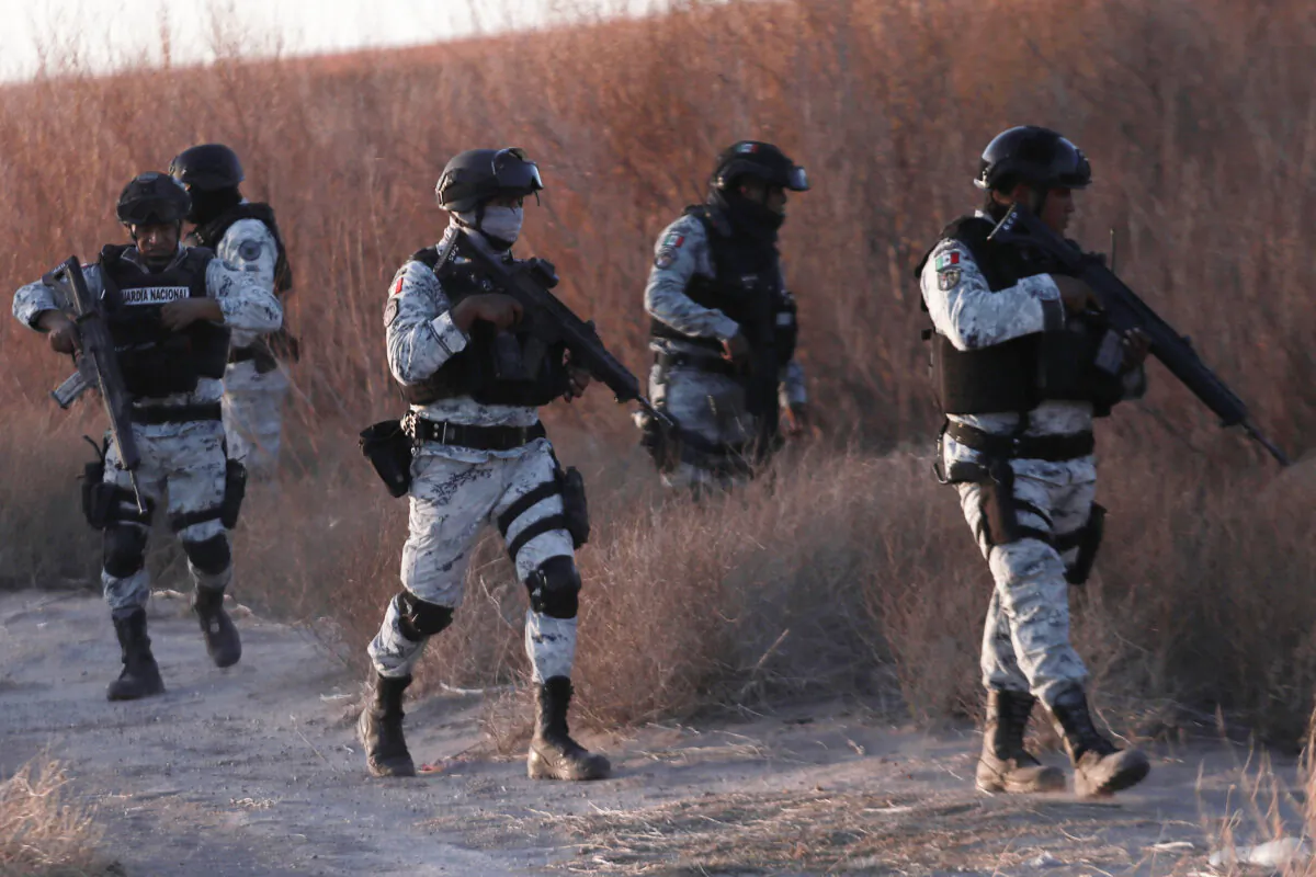 Mexican National Guard members patrol along the border in Ciudad Juárez in Mexico on Feb. 5, 2025. (Christian Chavez/AP)