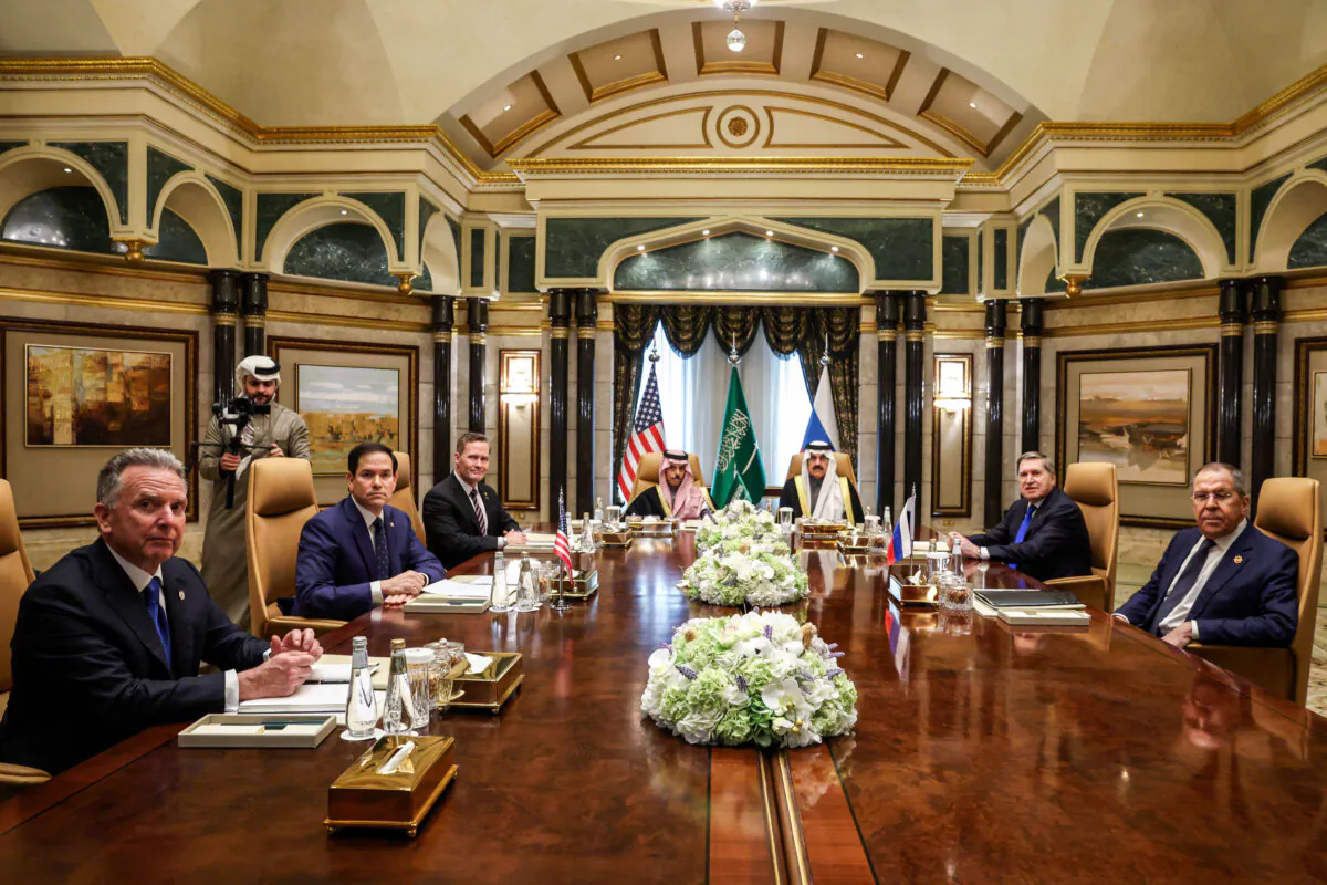 TOPSHOT - (L to R) US Middle East envoy Steve Witkoff, Secretary of State Marco Rubio, National Security Advisor Mike Waltz, Saudi Arabia's Foreign Minister Prince Faisal bin Farhan al-Saud, National Security Advisor Mosaad bin Mohammad al-Aiban, the Russian president's foreign policy advisor Yuri Ushakov, and Russia's Foreign Minister Sergei Lavrov attend a meeting together at Riyadh's Diriyah Palace on February 18, 2025. Top US and Russian diplomats were meeting in Saudi Arabia on Tuesday for talks on resetting their countries' fractured relations and making a tentative start on trying to end the Ukraine war. Both sides played down the chances that the first high-level meeting between the countries since US President Donald Trump took office would result in a breakthrough. (Photo by Evelyn Hockstein / POOL / AFP) (Photo by EVELYN HOCKSTEIN/POOL/AFP via Getty Images)