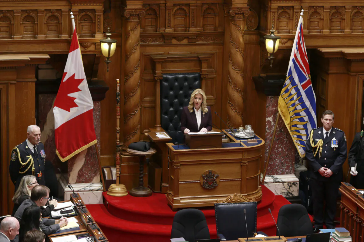 Lt.-Gov. Wendy Cocchia delivers the throne speech in the assembly at the legislature in Victoria, B.C., on Feb. 18, 2025. (THE CANADIAN PRESS/Chad Hipolito)
