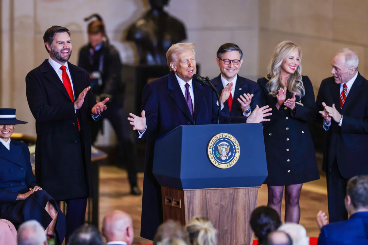 President Donald Trump speaks to the crowd alongside Vice President JD Vance (L); House Speaker Mike Johnson (R-La.) (3rd R); Johnson's wife, Kelly Johnson (2nd R); and House Majority Leader Steve Scalise (R-La.) in Emancipation Hall after Trump's inauguration, at the U.S. Capitol on Jan. 20, 2025. (Graeme Jennings-Pool/Getty Images)
