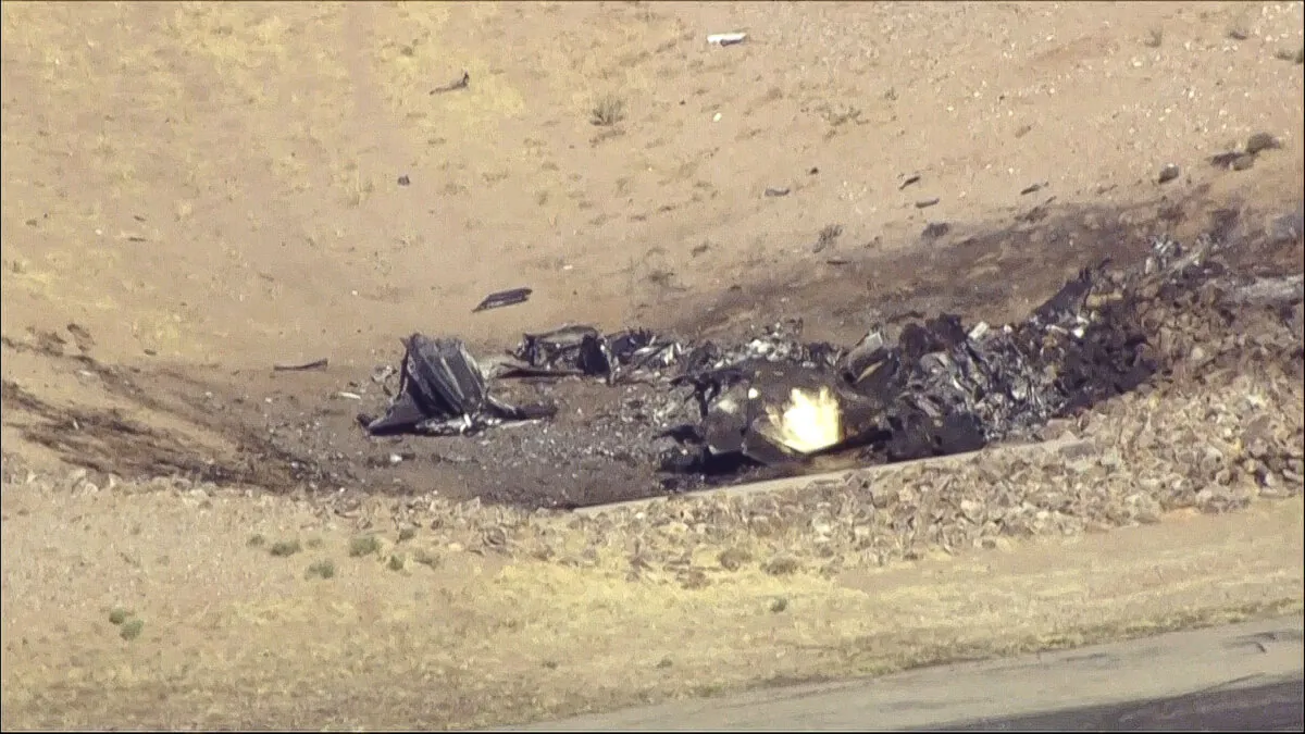 Plane debris at Marana Regional Airport after a deadly crash in Marana, Ariz. on Feb. 19, 2025, in a still from video. (KNXV via AP)