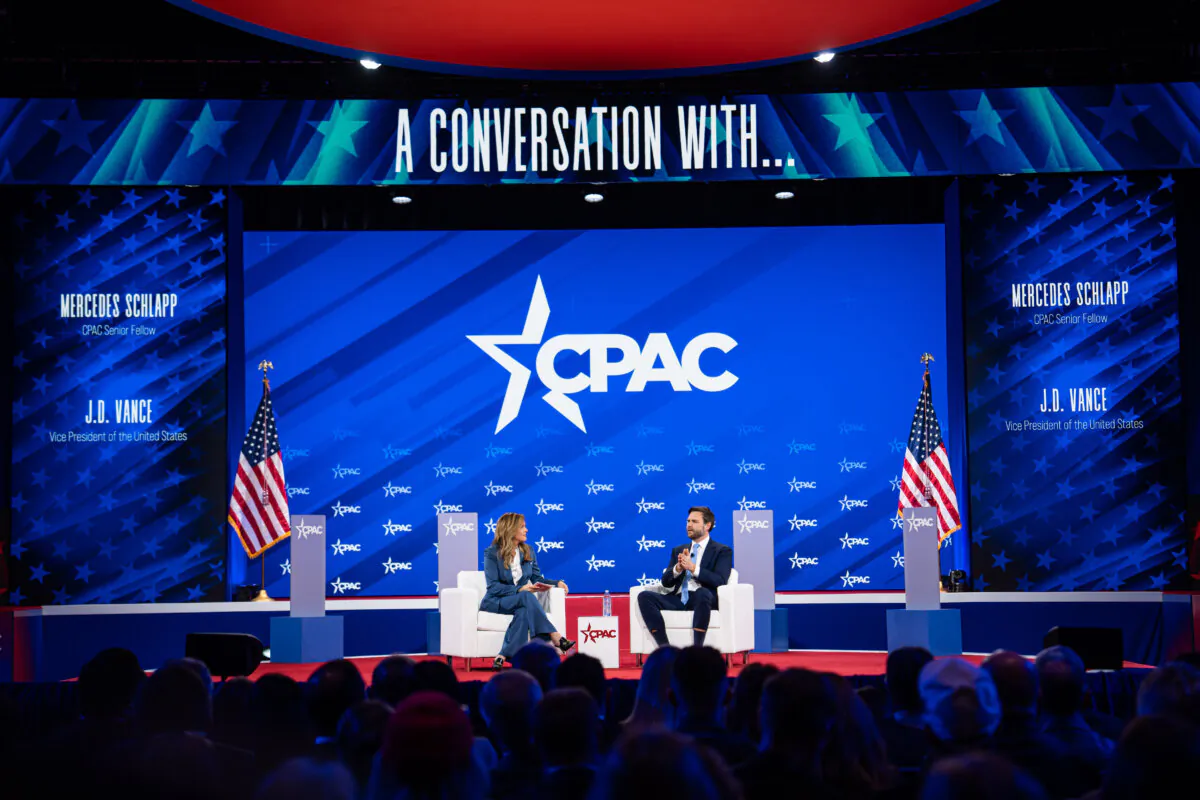 CPAC senior fellow Mercedes Schlapp and Vice President JD Vance speak during CPAC in Oxon Hill, Md., on Feb. 20, 2025. (Madalina Vasiliu/The Epoch Times)