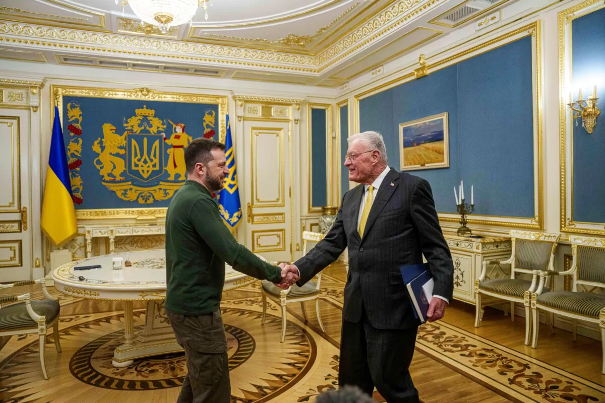 U.S. Special Envoy for Ukraine and Russia Keith Kellogg, right, and Ukraine's President Volodymyr Zelenskyy shake hands during their meeting in Kyiv, Ukraine, Feb. 20, 2025. (Evgeniy Maloletka/AP Photo)