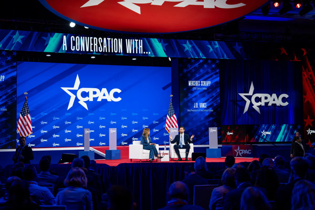 CPAC senior fellow Mercedes Schlapp and Vice President JD Vance speak during CPAC in Oxon Hill, Md., on Feb. 20, 2025. (Madalina Vasiliu/The Epoch Times)
