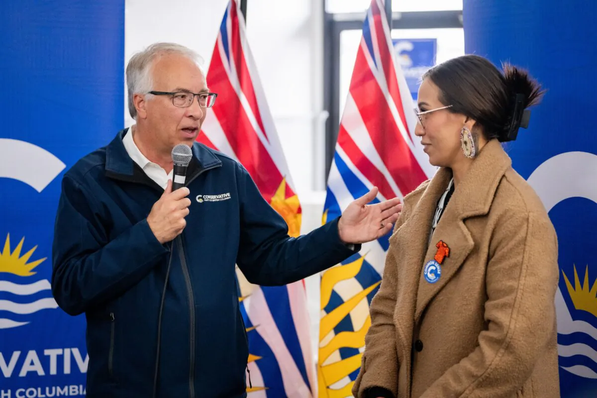 Conservative Leader John Rustad speaks alongside Chilliwack-Cultus Lake Conservative candidate A'aliya Warbus at a campaign office in Chilliwack B.C., on Oct. 17, 2024. (The Canadian Press/Ethan Cairns)