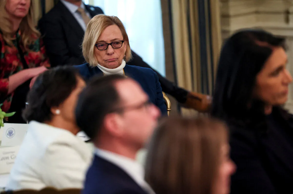 Maine Gov. Janet Mills sits as President Donald Trump hosts a business session with governors who are in town for the National Governors Association's (NGA) annual winter meeting, at the White House on Feb. 21, 2025. (Leah Millis/Reuters)