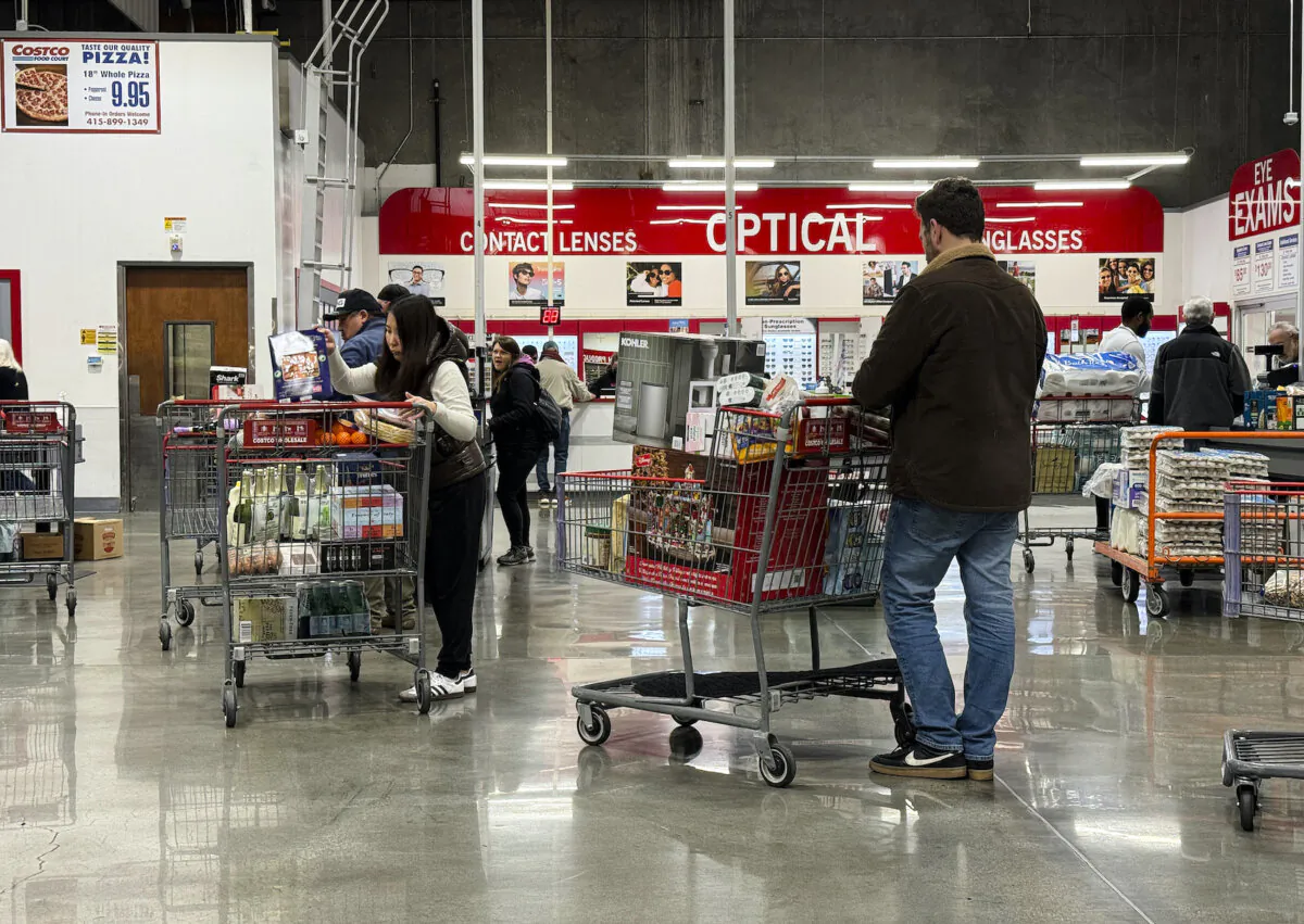 Customers wait in line to check out at a Costco store in Novato, Calif., on Dec. 11, 2024. (Justin Sullivan/Getty Images)