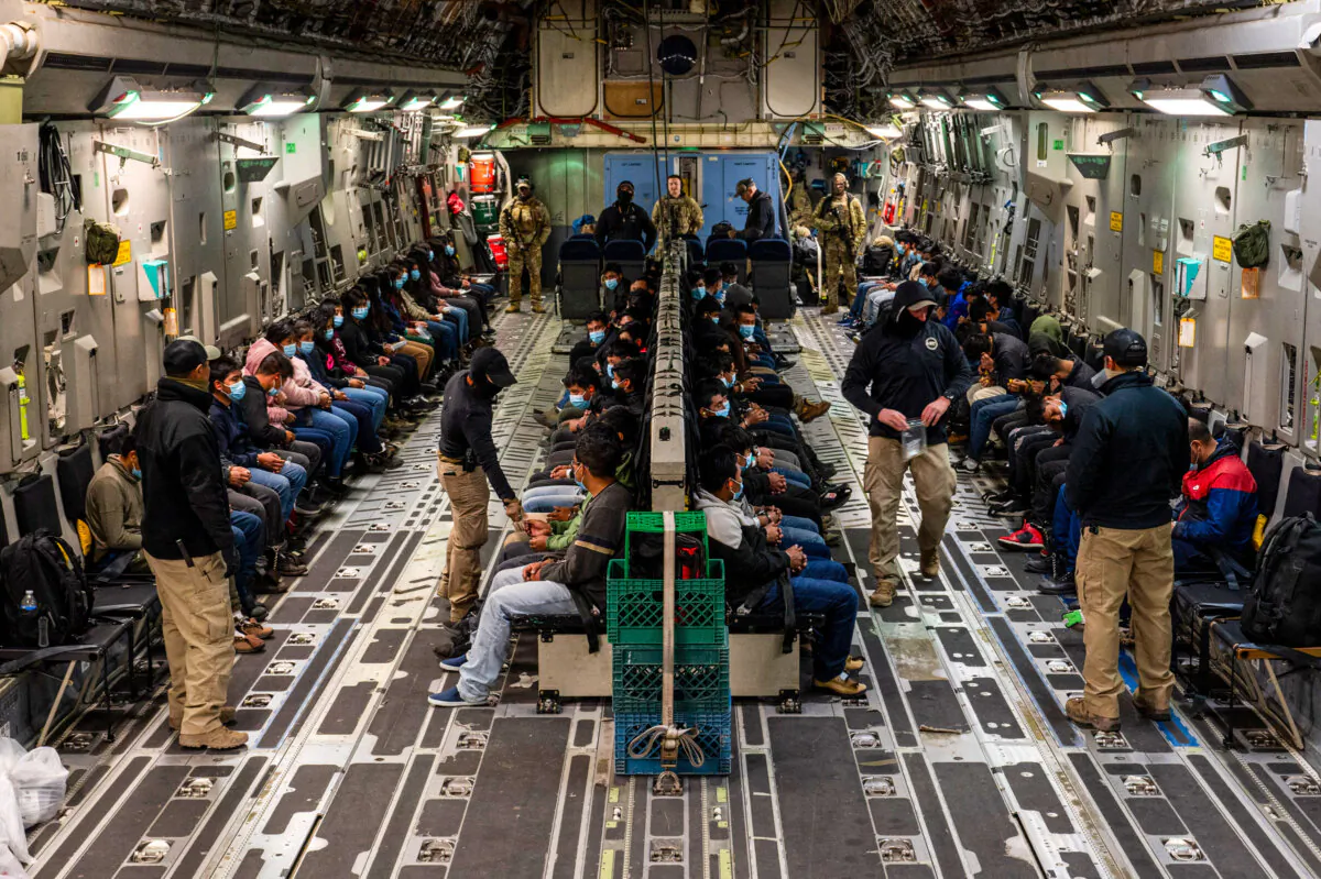Illegal immigrants await takeoff for a removal flight at the Tucson International Airport, Ariz., on Jan. 23, 2025. (Dept. of Defense photo by Senior Airman Devlin Bishop)