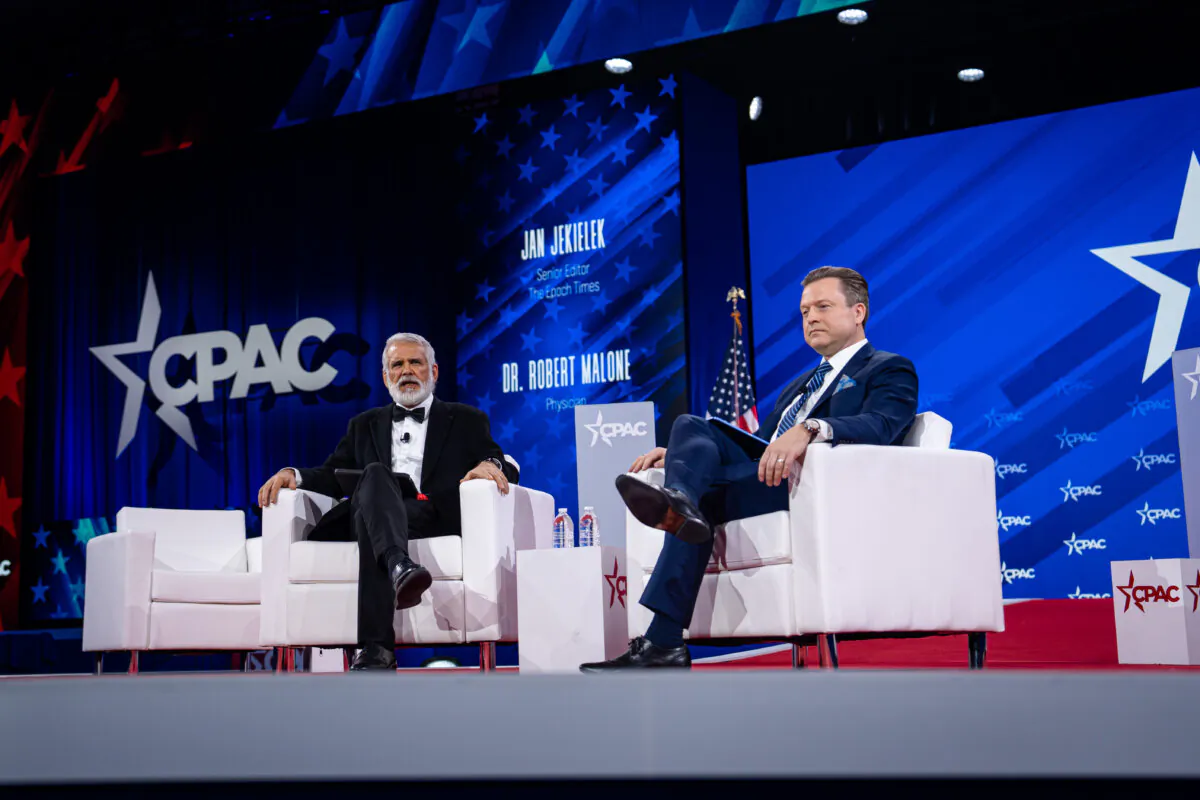 Dr. Robert Malone and Jan Jekielek, Epoch Times senior editor and host of American Thought Leaders, speak during the annual CPAC in Oxon Hill, Md., on Feb. 22, 2025. (Madalina Vasiliu/The Epoch Times)