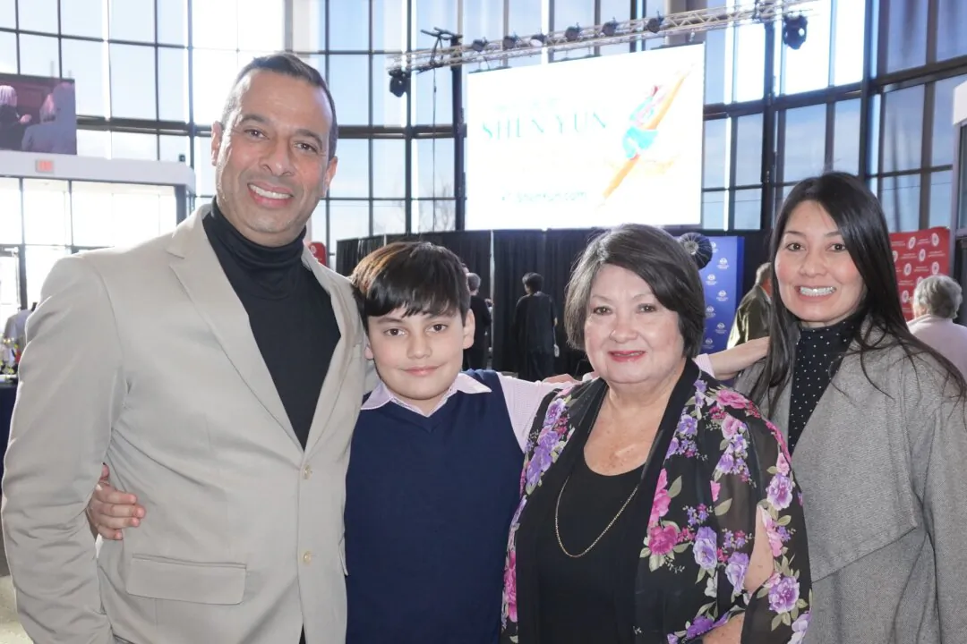 Miguel Santana, Waleee Kwan, her mother, and the couple's son attended Shen Yun Performing Arts at the OCCC Visual and Performing Arts Center Theater in Oklahoma City, Okla., on Feb. 23, 2025. (The Epoch Times)