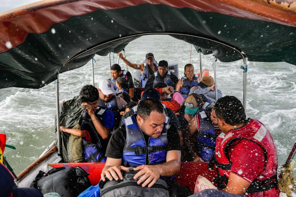 Venezuelan migrants on a boat leave Gardi Sugdub on Panama's Caribbean coast after giving up hopes of reaching the U.S. while in southern Mexico amid President Donald Trump's crackdown on illegal immigration, on Feb. 23, 2025. (Matias Delacroix/AP Photo)
