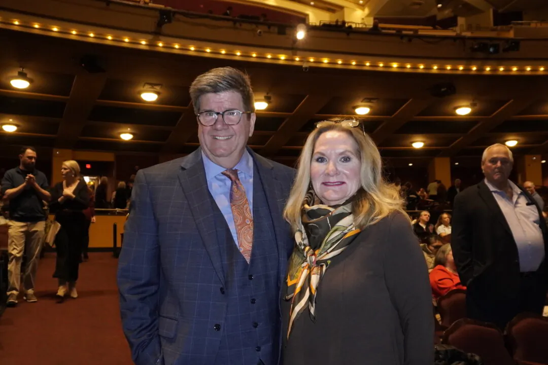 Paul Christensen and Lise Wabiszewski at Shen Yun Performing Arts at Miller High Life Theatre Milwaukee, Wis., on Feb. 23, 2025. (Nancy Ma/The Epoch Times)