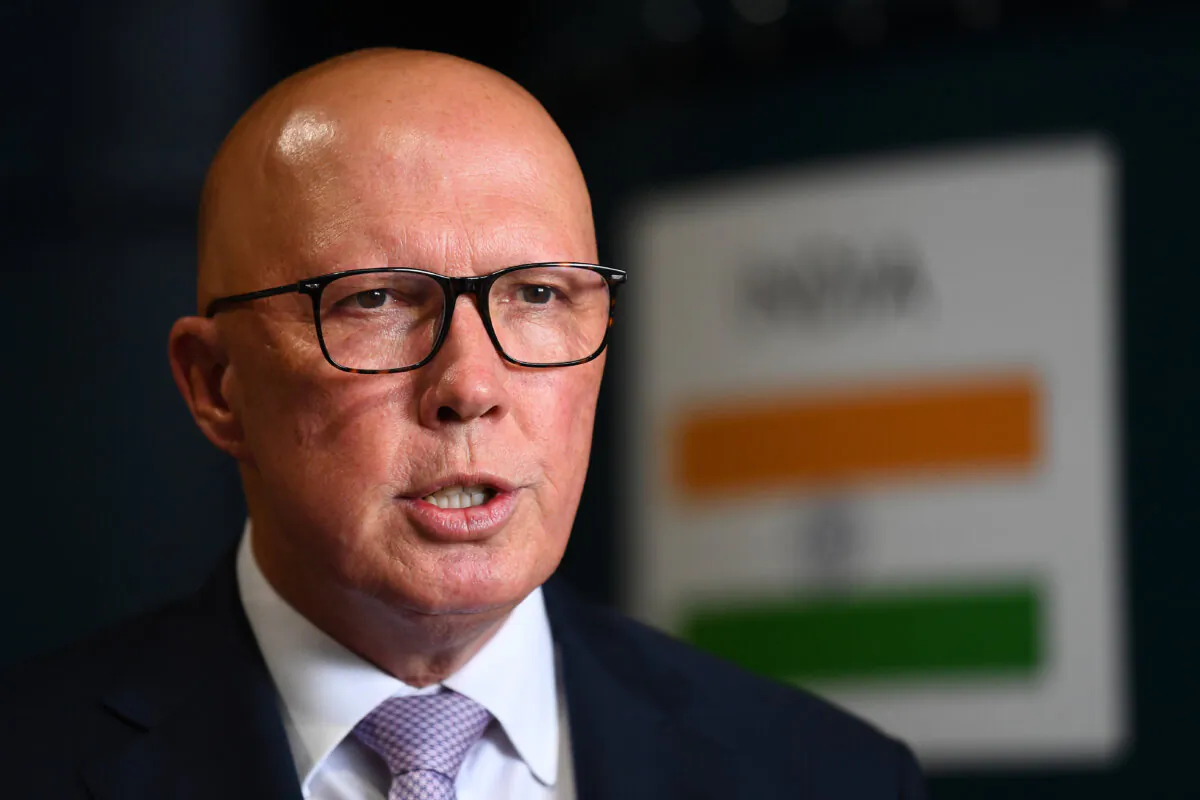 Leader of the Opposition Peter Dutton talks to media at the Coffee Commune during a visit in Brisbane, Australia on Feb. 17, 2025. (AAP Image/Jono Searle) 
