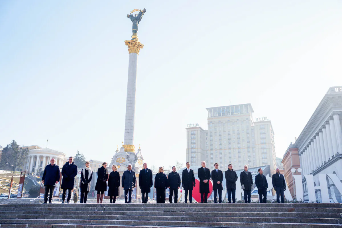 (L-R) OSCE Secretary General Feridun Sinirlioglu, Spain's Prime Minister Pedro Sanchez, Iceland's Prime Minister Kristrun Mjoll Frostadottir, Denmark's Prime Minister Mette Frederiksen, European Commission President Ursula von der Leyen, European Council President Antonio Costa, Latvia's President Edgars Rinkevics, Ukraine's First Lady Olena Zelenska, Ukraine's President Volodymyr Zelensky, Finland's President Alexander Stubb, Lithuania's President Gitanas Nauseda, Canada's Prime Minister Justin Trudeau, Estonia's President Kristen Michal, Norway's Prime Minister Jonas Gahr Store, Sweden's Prime Minister Ulf Kristersson and France's Delegate Minister for Europe Benjamin Haddad stand in respect during a ceremony to mark the third anniversary of the Russian invasion of Ukraine, at the Independence Square in Kyiv, Ukraine, on Feb. 24, 2025. (Javad Parsa/NTB/AFP via Getty Images)