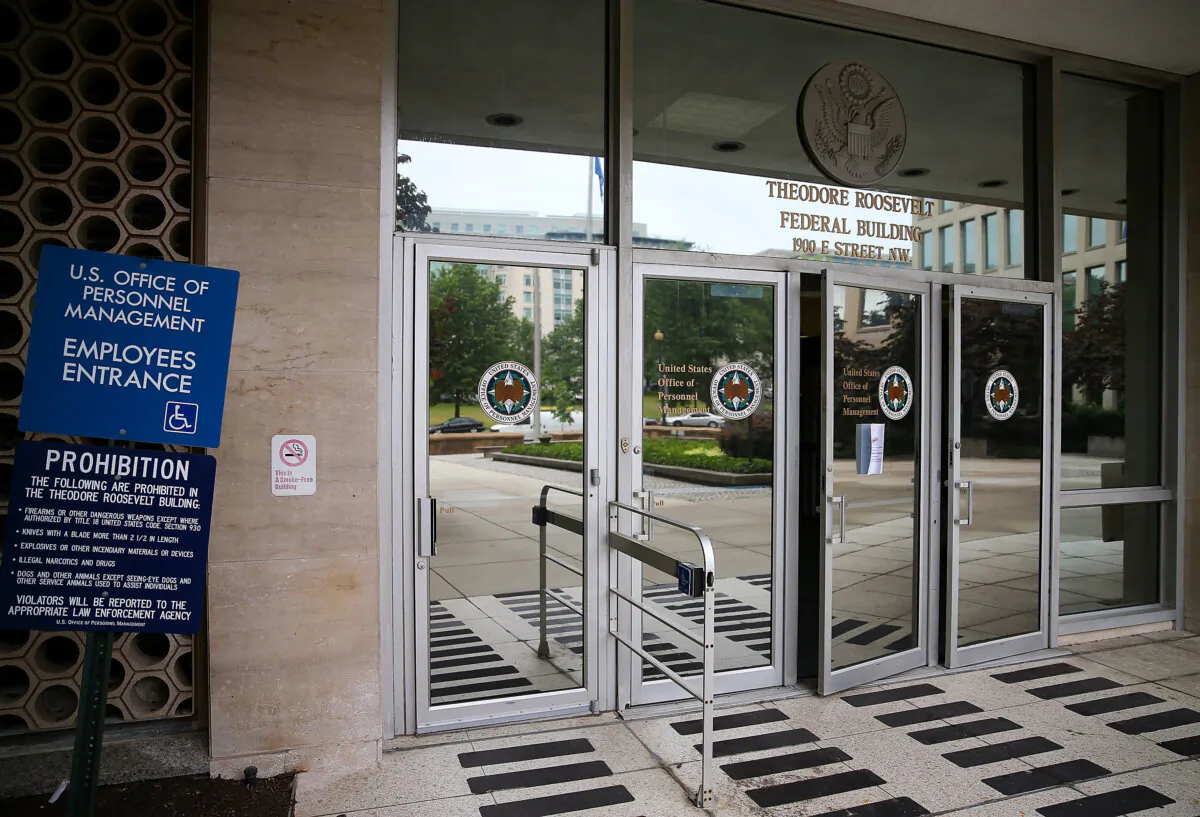 The entrance to the Theodore Roosevelt Federal Building that houses the Office of Personnel Management headquarters is shown in Washington, DC, on June 5, 2015. (Mark Wilson/Getty Images)