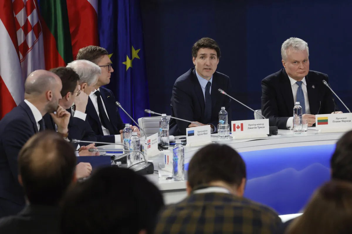 (L–R) French Minister Delegate for European Affairs Benjamin Haddad, Sweden’s Prime Minister Ulf Kristersson, Norway’s Prime Minister Jonas Gahr Stoere, Estonia’s Prime Minister Kristen Michal, Canada’s Prime Minister Justin Trudeau, and Lithuania’s President Gitanas Nauseda attend a press conference after the “Support Ukraine” summit, marking the third anniversary of the Russian invasion, in Kyiv, Ukraine, on Feb. 24, 2025. (Gleb Garanich/Pool Photo via AP)