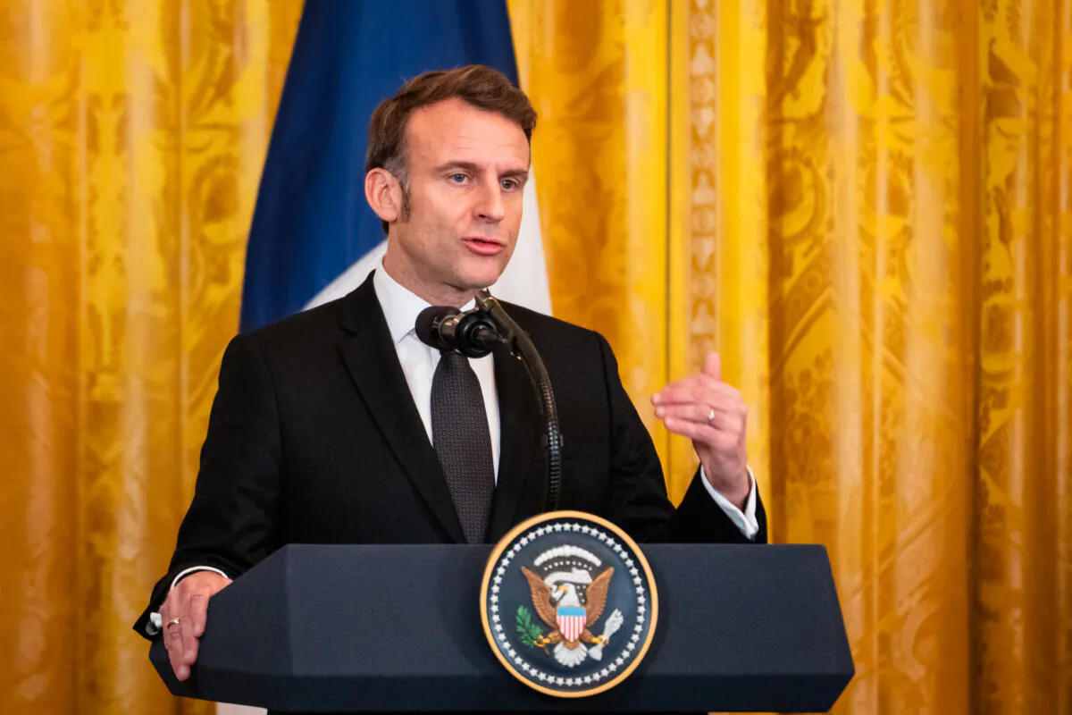 French President Emmanuel Macron speaks during a press conference with President Donald Trump at the White House in Washington on Feb. 24, 2025. (Madalina Vasiliu/The Epoch Times)