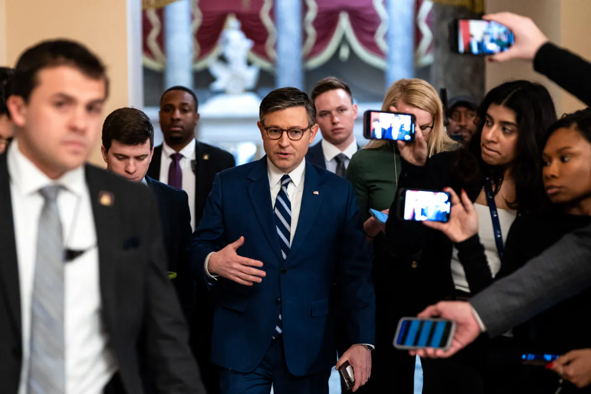 Speaker of the House Mike Johnson (R-LA) speaks with reporters as he walks to the House Chamber from his office at the U.S. Capitol in Washington, DC, on Feb. 24, 2025. (Kent Nishimura/Getty Images)