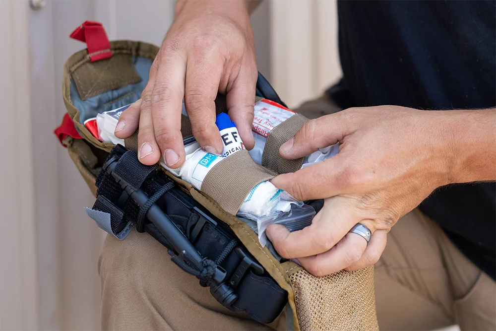 Opening a Refuge Medical BearFak 3.0 First Aid Kit. (Refuge Medical)