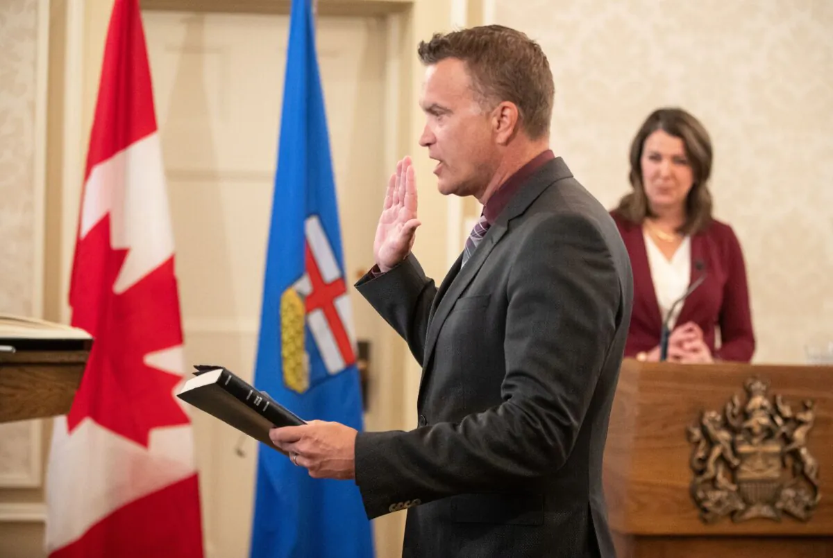 Alberta Minister of Infrastructure Peter Guthrie is sworn into cabinet in Edmonton on June 9, 2023. (The Canadian Press/Jason Franson)