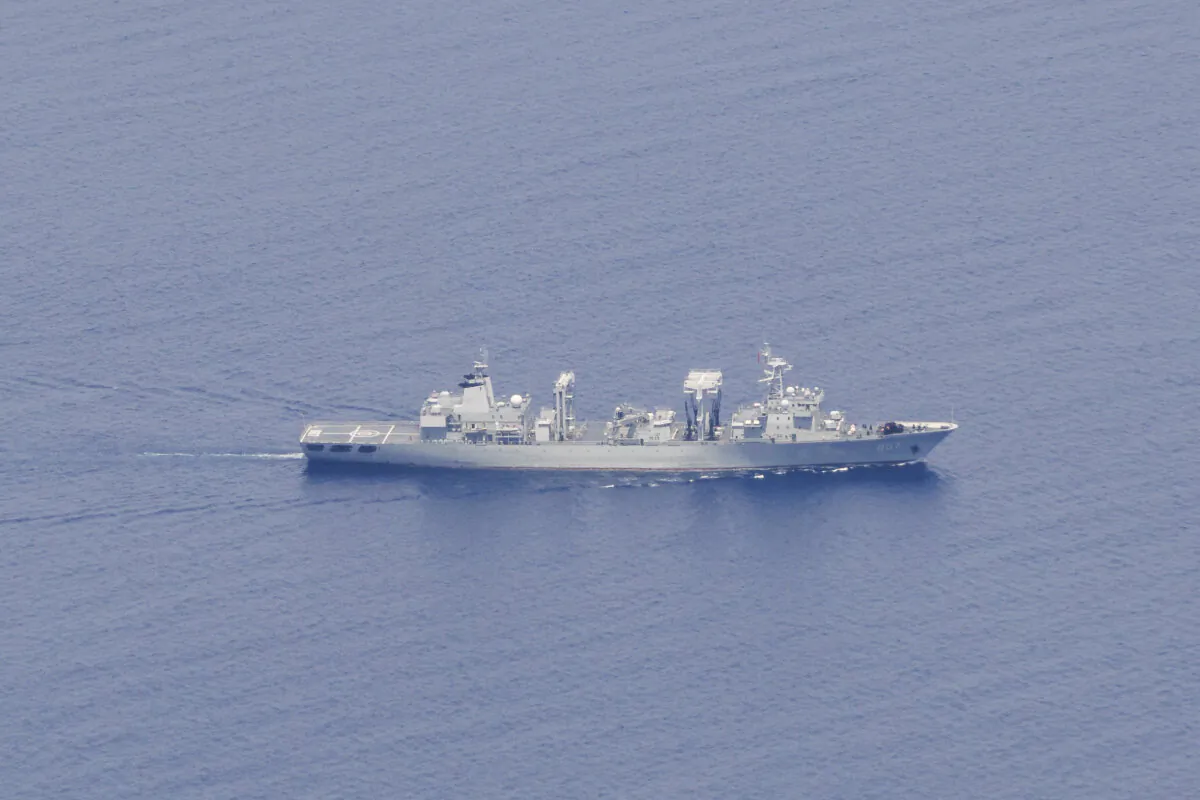 The Chinese Peoples Liberation Army-Navy Fuchi-class replenishment vessel Weishanhu in the Solomon Sea. (Courtesy of the Australian Defence of Department)
