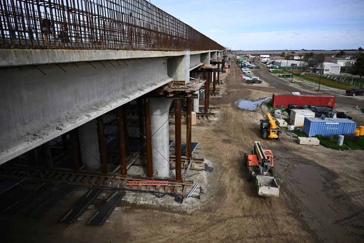 Construction workers build the Hanford Viaduct over Highway 198 as part of the California High Speed Rail transit project in Hanford, California, on Feb. 12, 2025. (Patrick T. Fallon/AFP via Getty Images)
