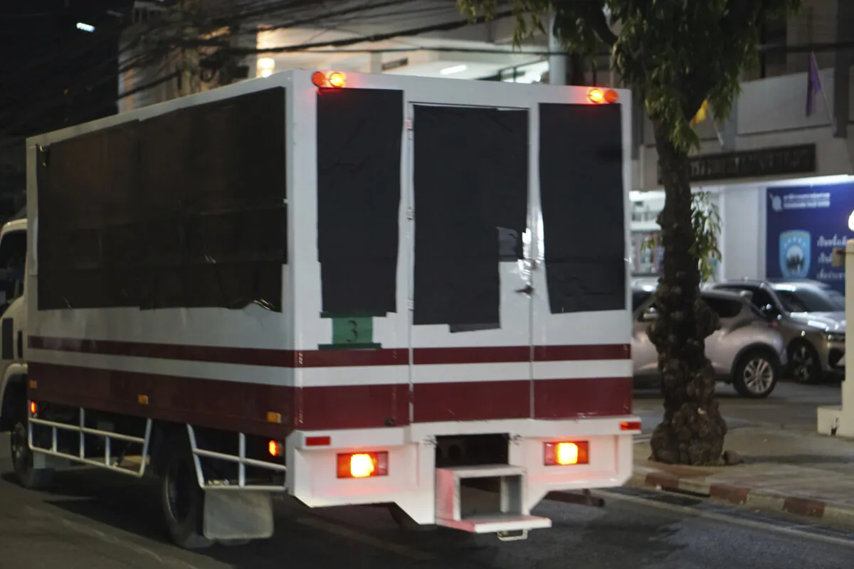 Trucks with black tape covering the windows leave a detention center in Bangkok, Thailand, on Feb. 27, 2025.(Nuttaphol Meksobhon/Prachatai via AP)