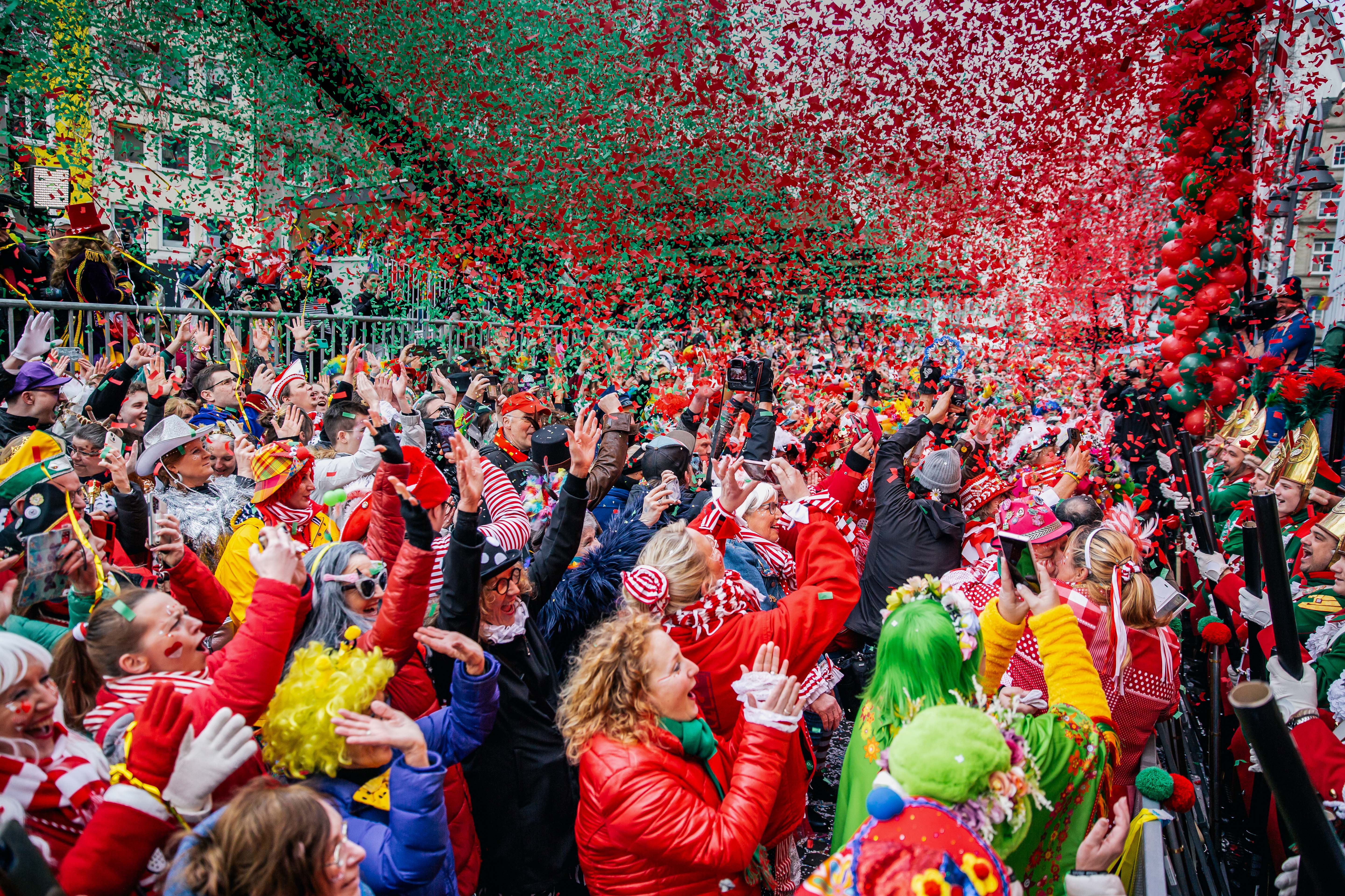 Day in Photos: Fat Thursday Carnival, Terrorist Attack in Congo, and Polar Bear Cub