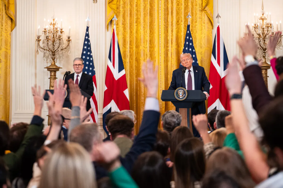 UK Prime Minister Keir Starmer (L) and U.S. President Donald Trump speak during a joint press conference at the White House on Feb. 27, 2025. (Madalina Vasiliu/The Epoch Times)