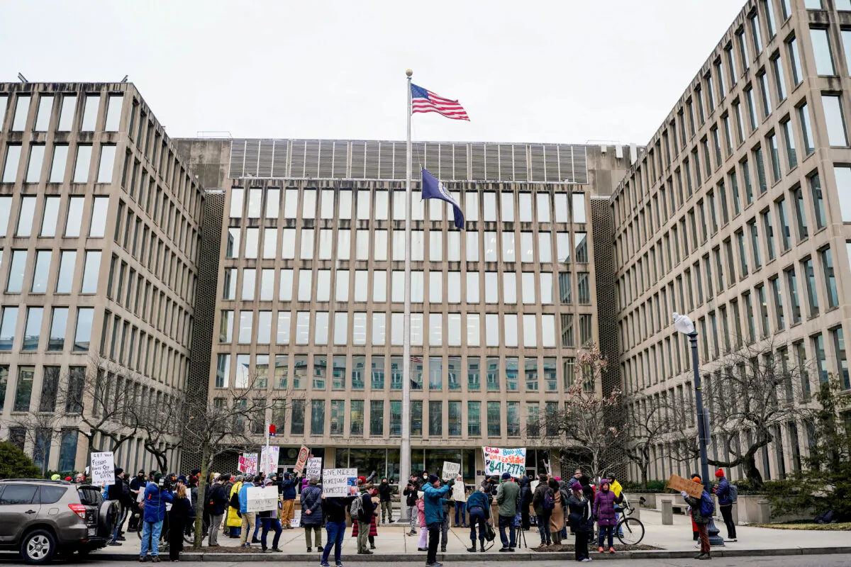 Demonstrators rally outside the U.S. Office of Personnel Management in Washington on Feb. 5, 2025. (Nathan Howard/Reuters)