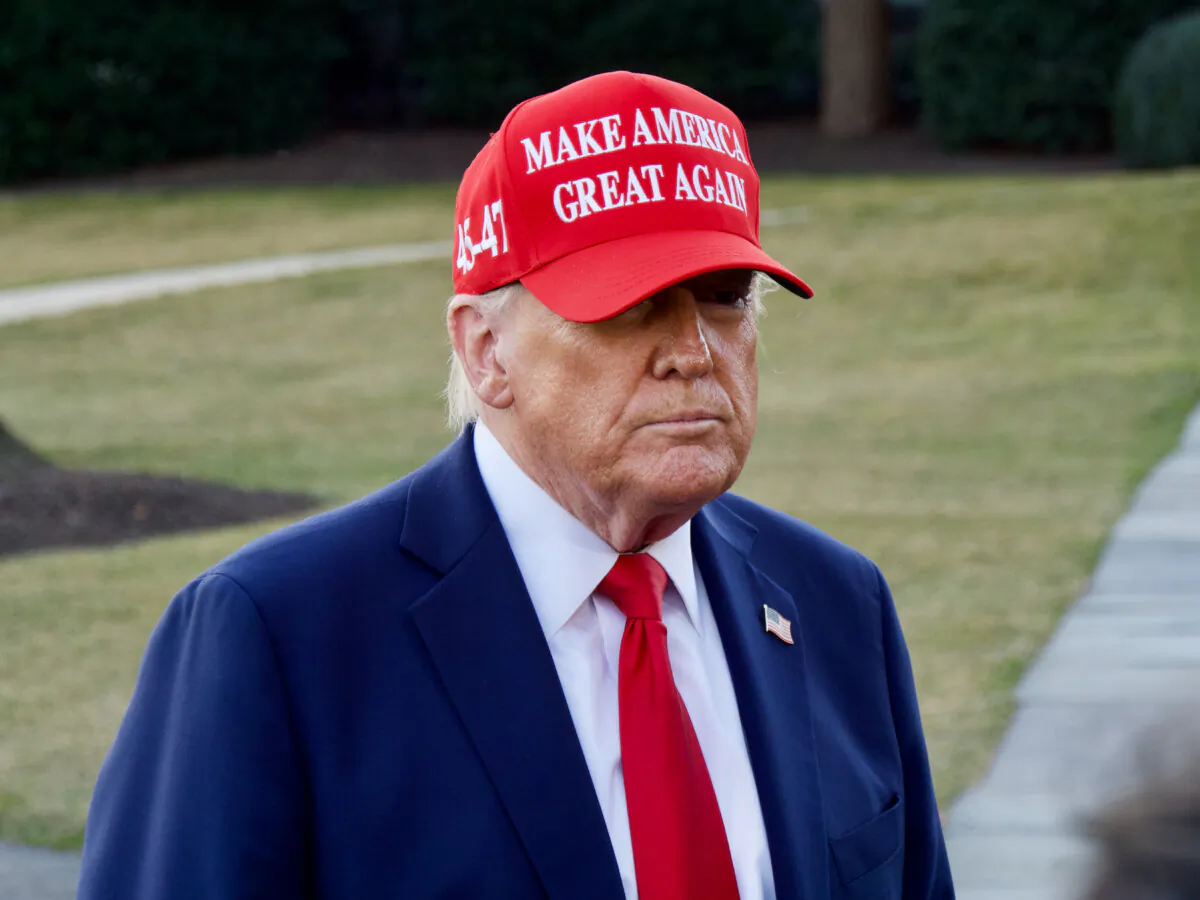President Donald Trump speaks to reporters outside the Oval Office on Feb. 28, 2025. (Travis Gillmore/The Epoch Times)