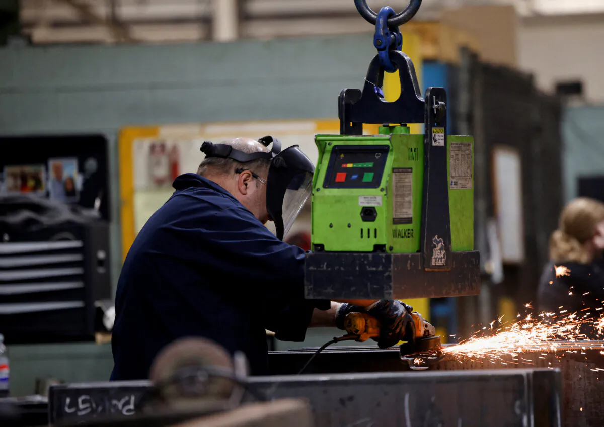 A worker is seen doing his job at the Anchor Danly manufacturing plant in Windsor, Ontario, on Jan. 16, 2025. (Reuters/Rebecca Cook/File Photo) 