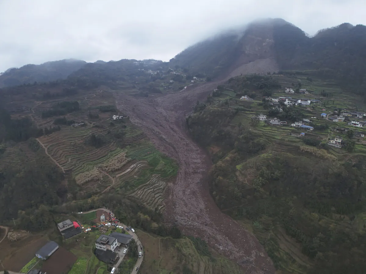 An aerial drone photo shows the site of a landslide in Jinping Village, Junlian County, in the city of Yibin, southwest China's Sichuan Province, on Feb. 8, 2025. (Zeng Li/Xinhua via AP)