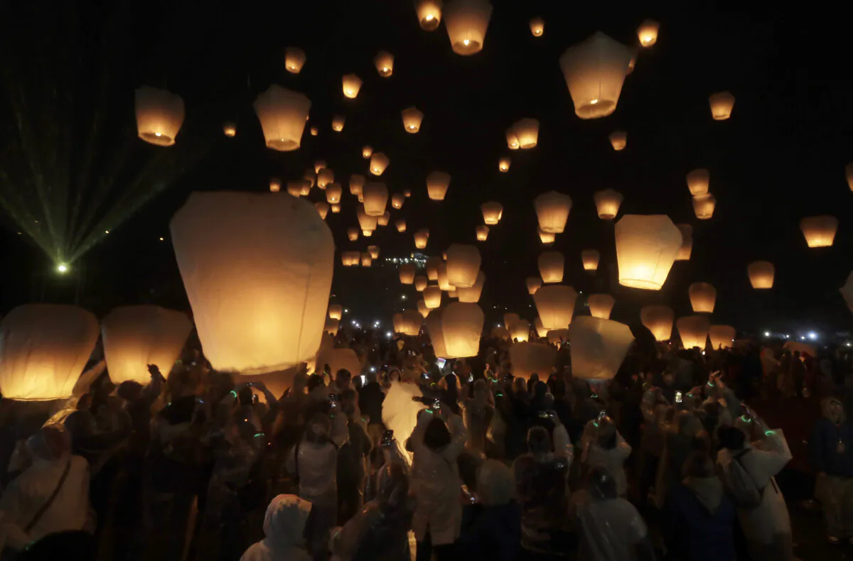 People release sky lanterns in hopes of good fortune and prosperity in the traditional Lantern Festival in the Pingxi district of New Taipei City, Taiwan, Wednesday, Feb. 12, 2025. (Chiang Ying-ying/AP Photo)