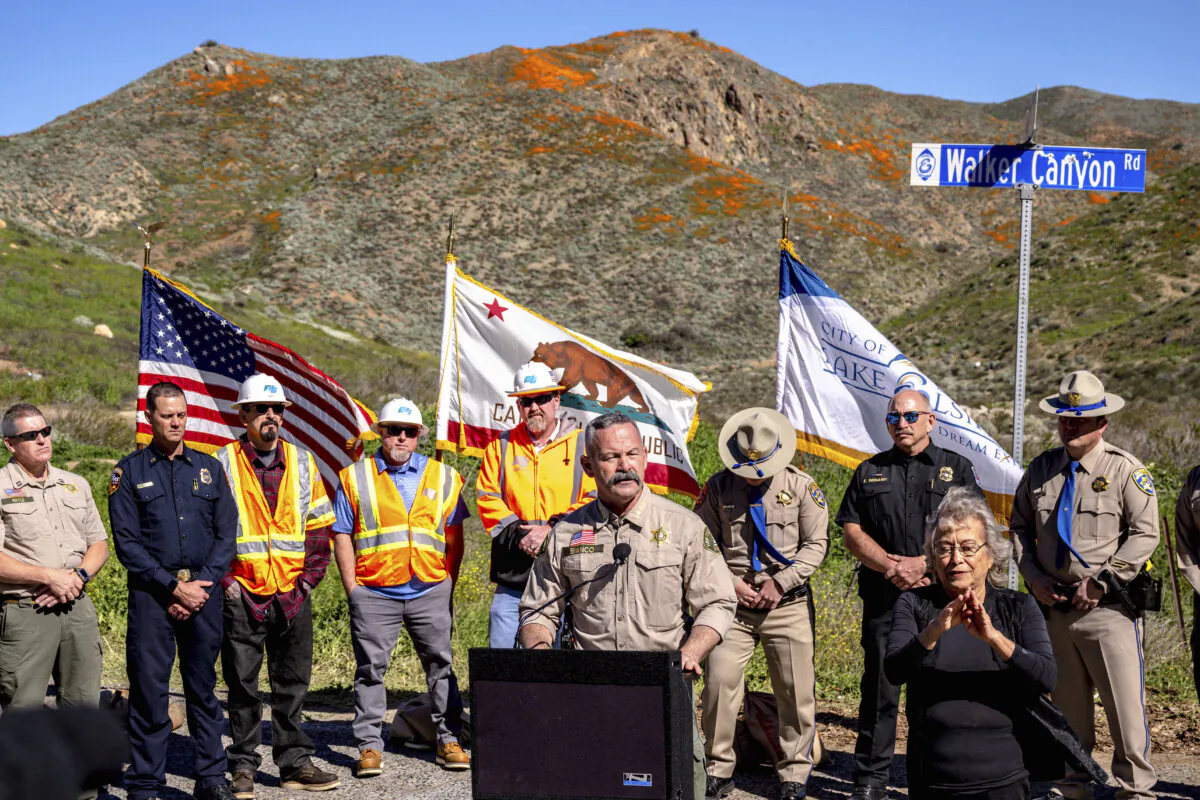 Riverside County Sheriff Chad Bianco speaks at a news conference in Lake Elsinore, Calif., Feb. 7, 2023, as officials announced that the closure of poppy fields at Walker Canyon until the wildflower bloom subsides. (Watchara Phomicinda/The Orange County Register via AP)
